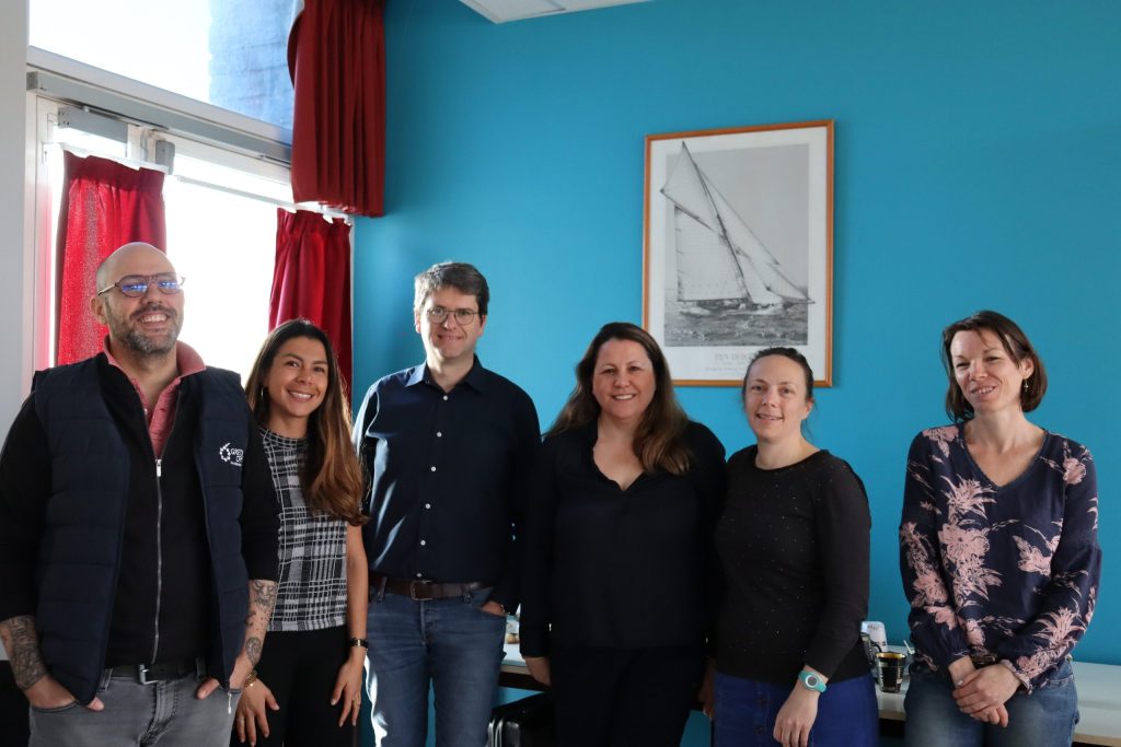 photo de groupe de l'atelier de retour d'expérience